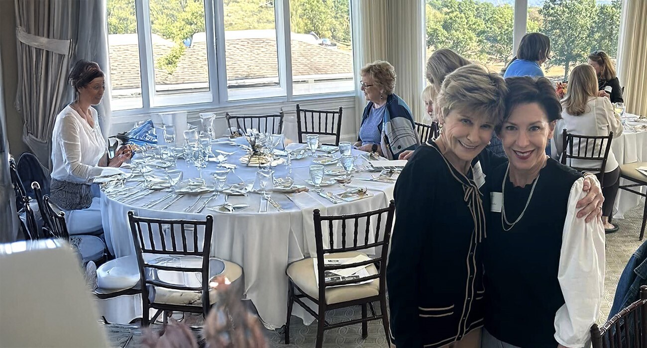 2 women smiling
